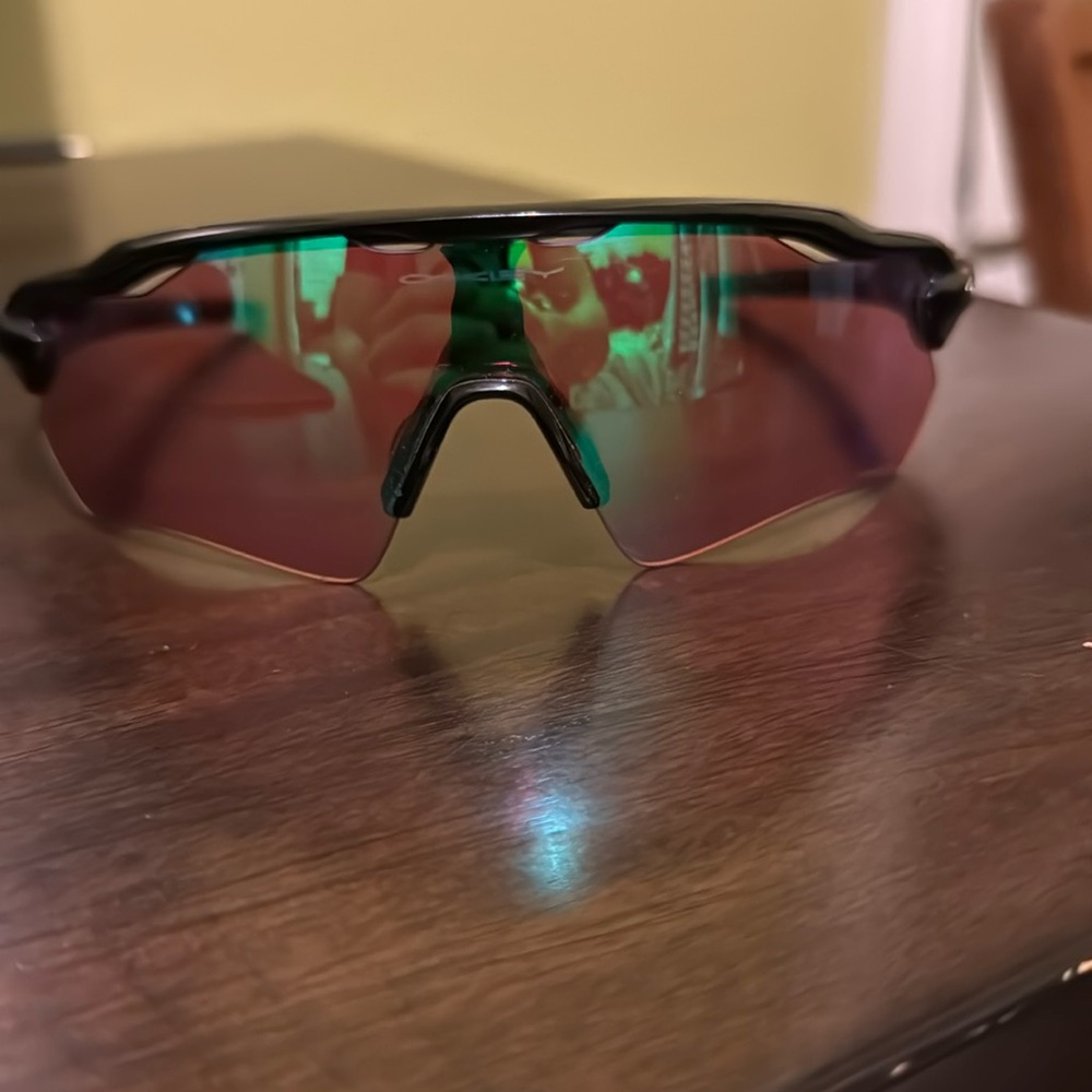 Oakley Sunglasses with Black Frame and Green Lenses